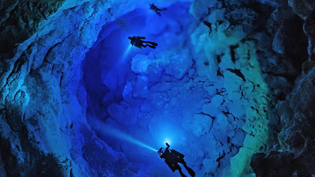 Dive deeper into adventure at Cenote Sac Actun, part of one of the world’s largest underwater cave systems